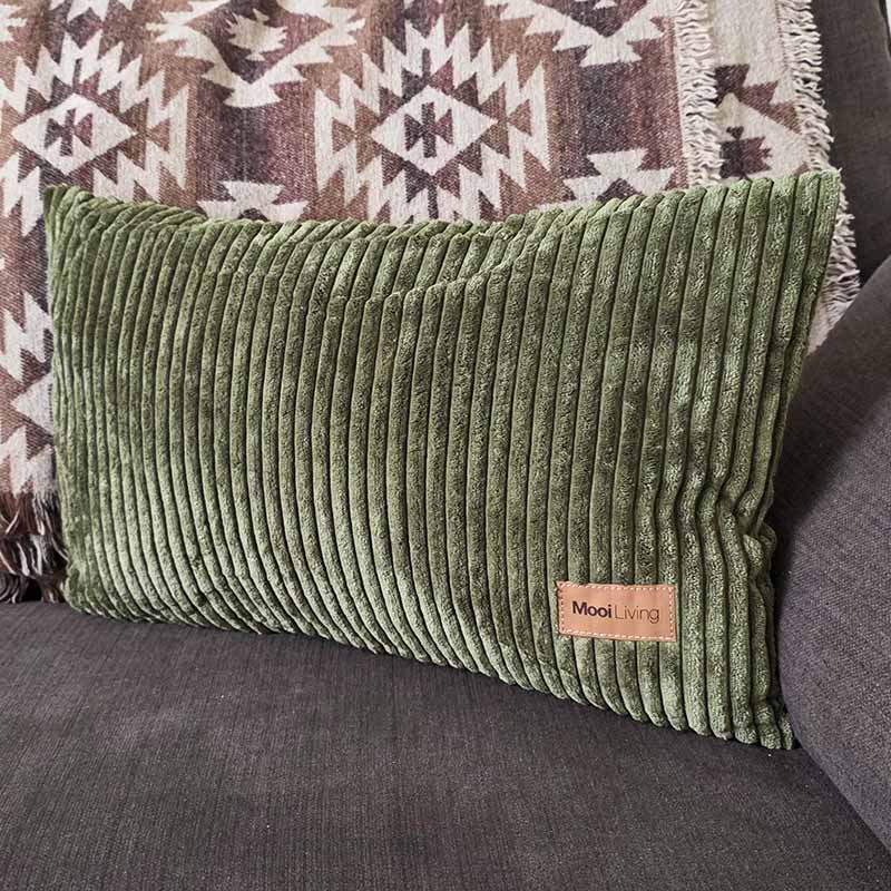 Olive Green corduroy cushion indoor Bean Bag by Mooi Living, with a Mooi Living brand label. This cushion is a perfect match to our Cord Chair, Double Cord Lounger, and Corduroy Cloud.