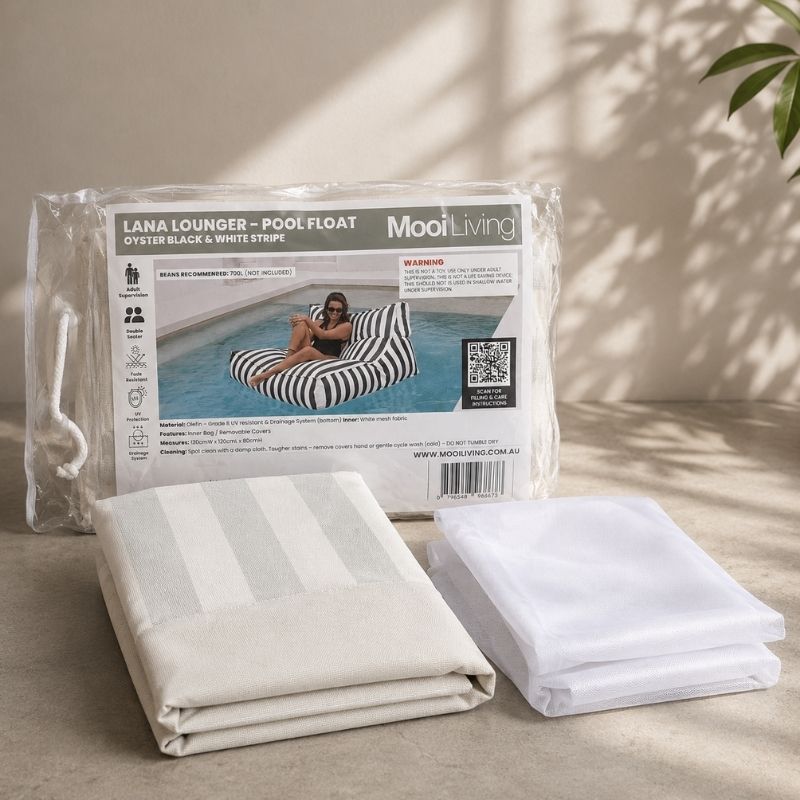 Folded Lana lounger pool float bean bag cover in Oyster black and white stripe and inner bag in a Mooi Living packaging.