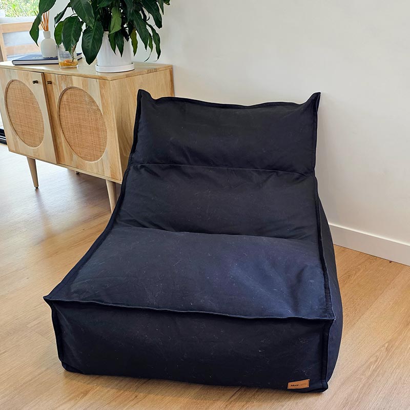 Black Single Boss Bean Bag Chair by Mooi Living displayed in a clean architectural living space.