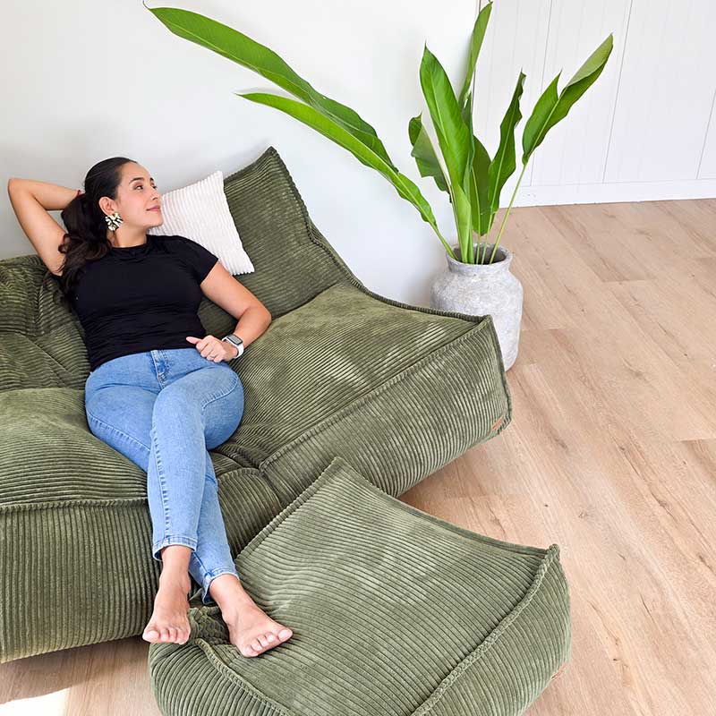 Mooi Double Cord Bean Bag indoor bean bag by Mooi Living and Cord Ottoman in Olive Green. Dual seating in luxe cord fabric featuring three inner bags for structured support and effortless setup.