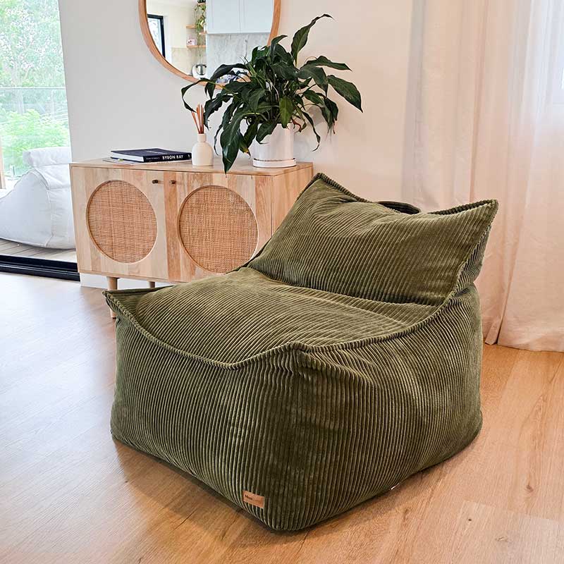 Olive green corduroy indoor bean bag by Mooi Living styled in a modern living room