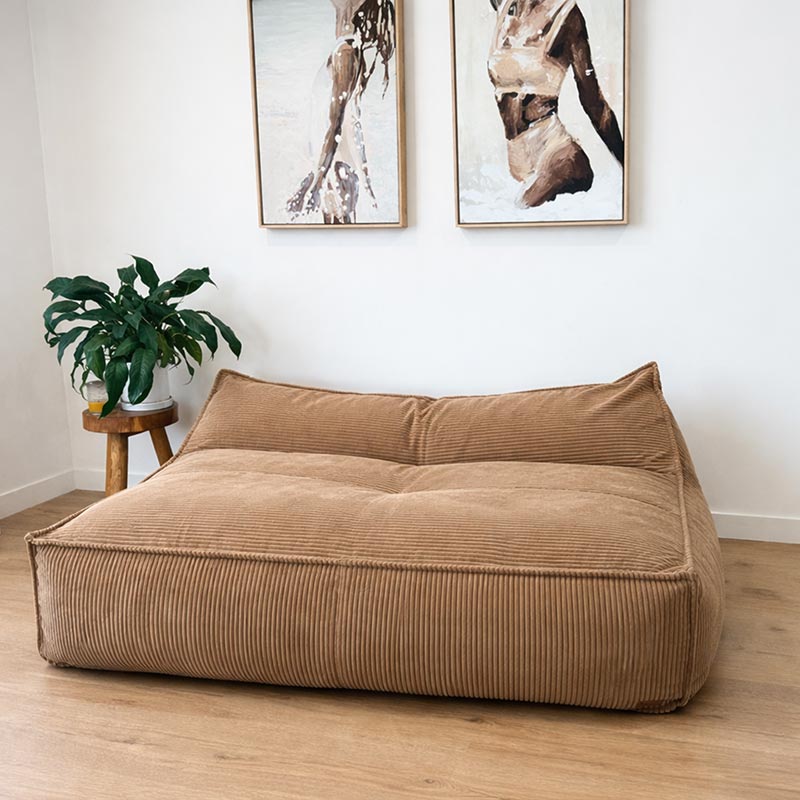 Caramel Mooi Double Seater Corduroy Bean Bag Lounger indoor bean bag by Mooi Living on timber flooring in a living room.