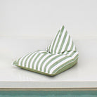 Mooi Living Sage Green reversible triangle outdoor bean bag showing its plain sage green side with striped edging, MOREVSTRIBB-GRE