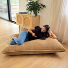 Corduroy Cloud in Caramel  indoor bean bag by Mooi Living. A versatile corduroy bean bag designed for modern living - use it flat, upright, or hammock-style for effortless comfort in every corner of your home.