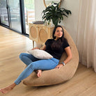 Corduroy Cloud in Caramel indoor bean bag by Mooi Living. A versatile corduroy bean bag designed for modern living - use it flat, upright, or hammock-style for effortless comfort in every corner of your home.