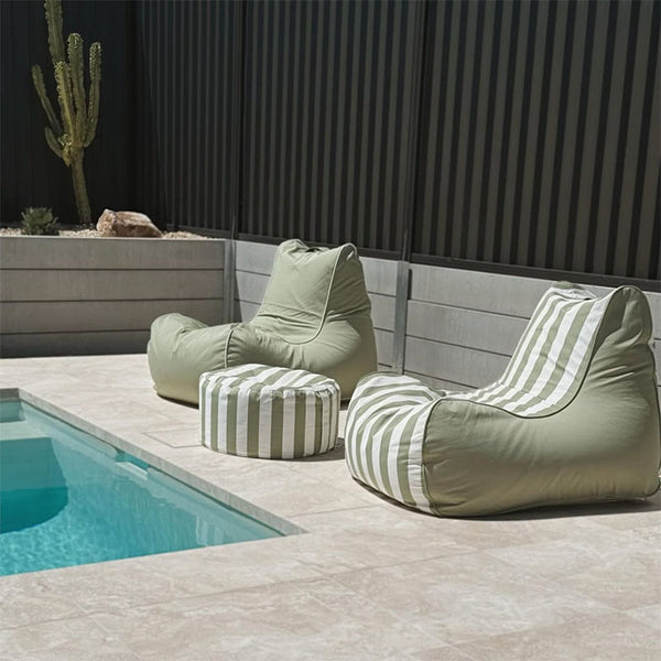 Green Stripe Bora Bora Bean Bag Chair and Sage Green Solid Bora Bean Bag with Green Stripe Outdoor Ottoman by Mooi Living in a poolside setting, customer photo by @casa_griffin