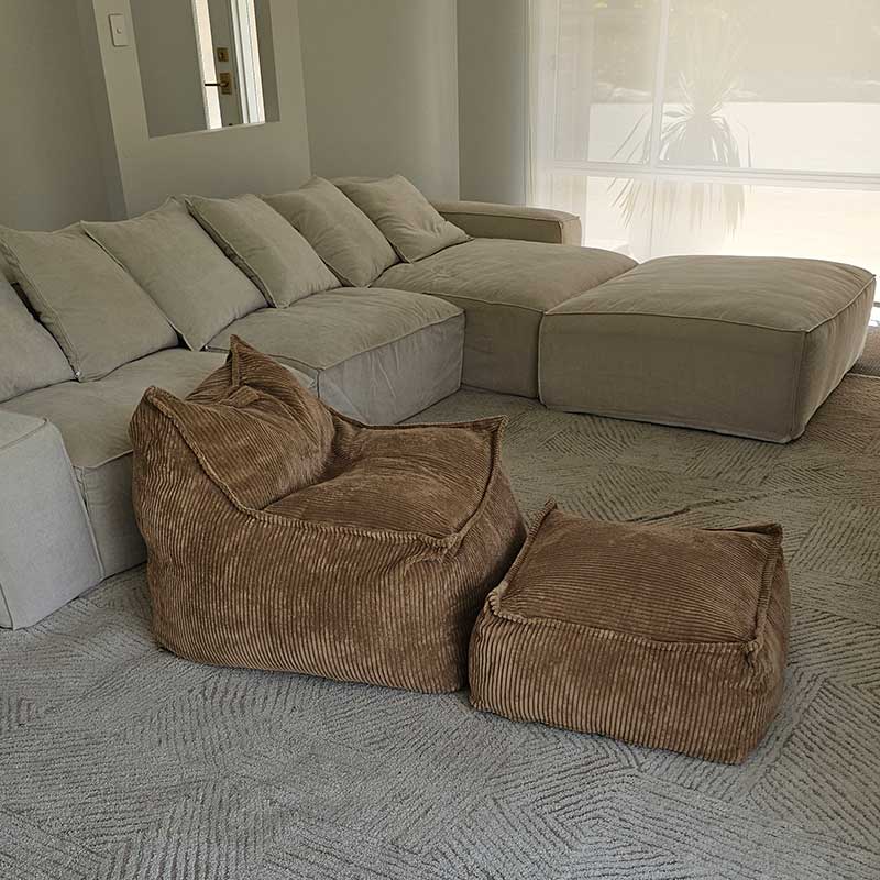 Mini Cord Bean Bag Chair and Cord Ottoman indoor bean bag by Mooi Living in Caramel in a cozy living space.