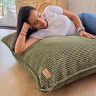 Corduroy Cloud in Olive Green  indoor bean bag by Mooi Living. A versatile corduroy bean bag designed for modern living - use it flat, upright, or hammock-style for effortless comfort in every corner of your home.