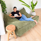 Mooi Double Cord Bean Bag indoor bean bag by Mooi Living in Olive Green. Dual seating in luxe cord fabric featuring three inner bags for structured support and effortless setup.